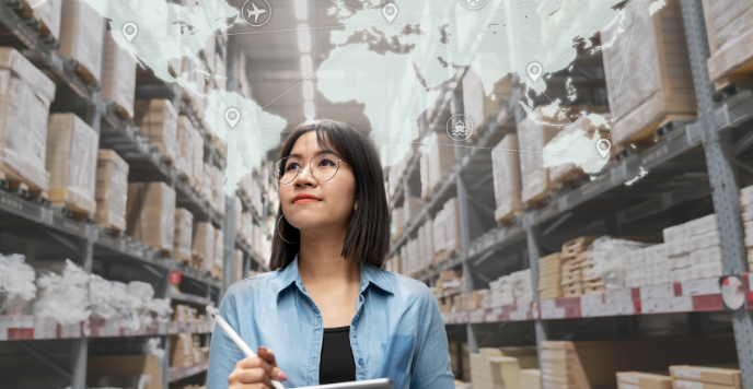 Woman checking inventory at store warehouse.